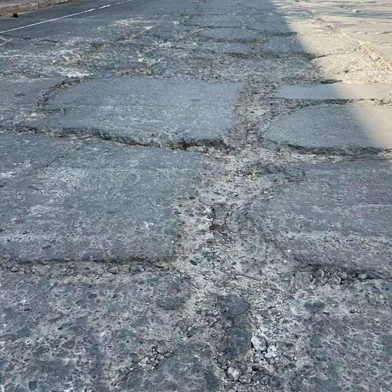 大东路面起砂露石子修补料